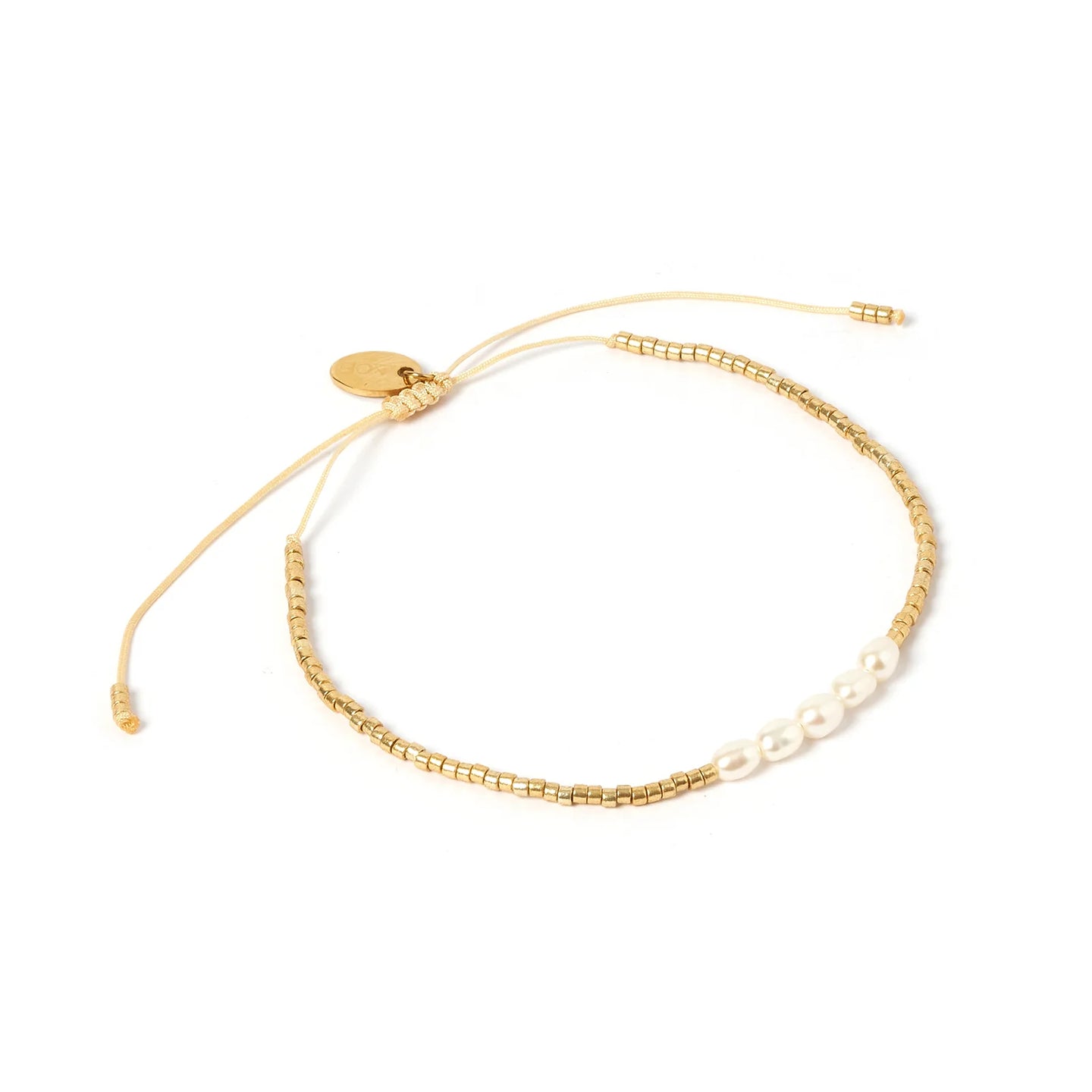 SELINE GOLD AND PEARL BRACELET BY ARMS OF EVE